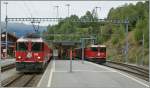 RhB Ge 4/4 II mit RE nach St.Moritz (links) und Davos (rechts) in Filisur.